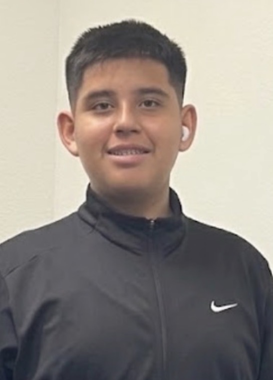 Carlos wearing a hoodie